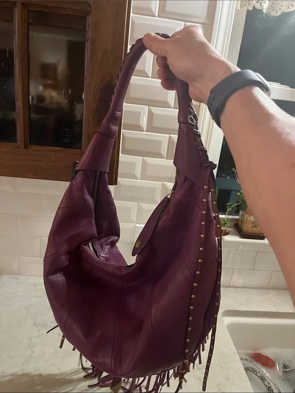 orYANY purple Studded  fringed Leather Hobo Bag with geometric interior material